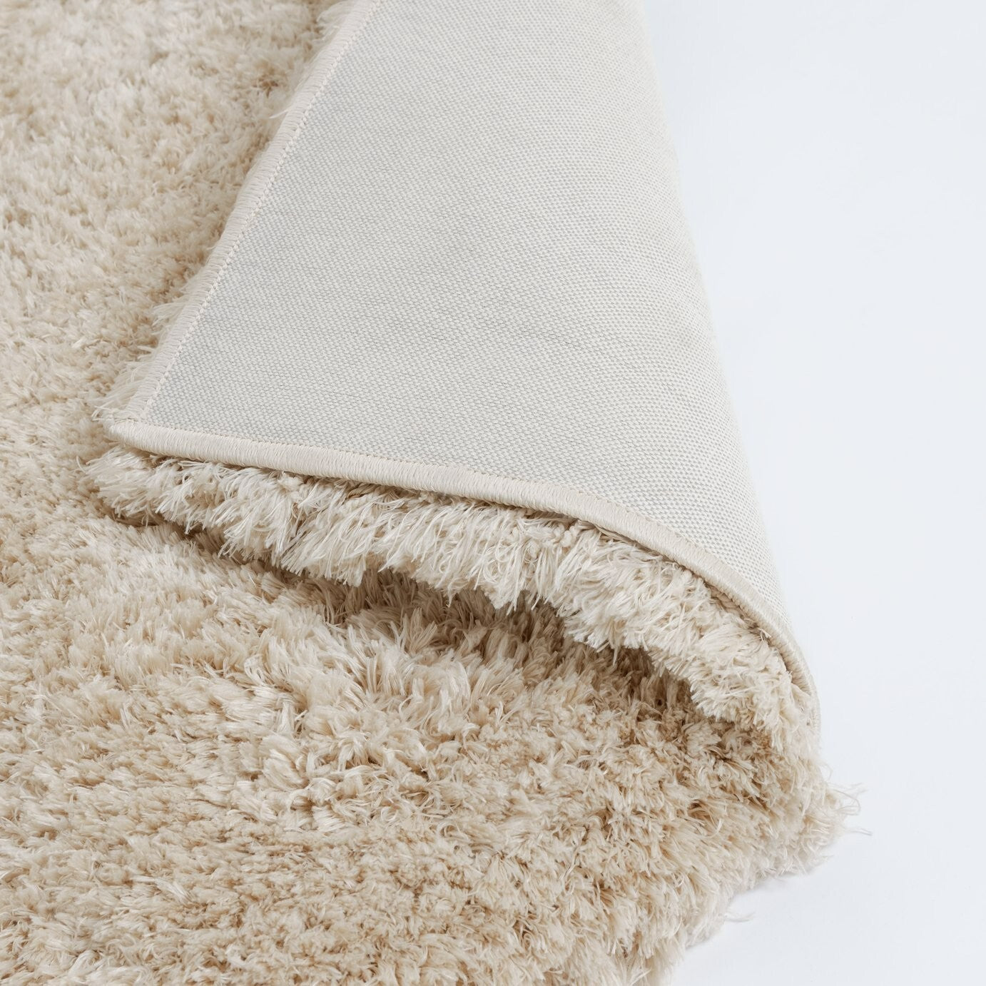 Habitat Airmaster Plain Sand Shaggy Rug - 170x120cm